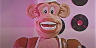 creepy monkey puppet